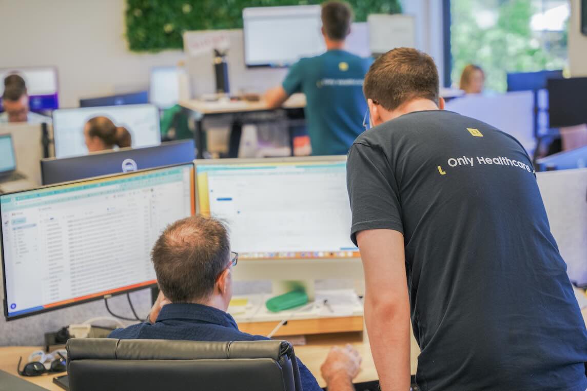 Matt and Ian reviewing paid performance campaign